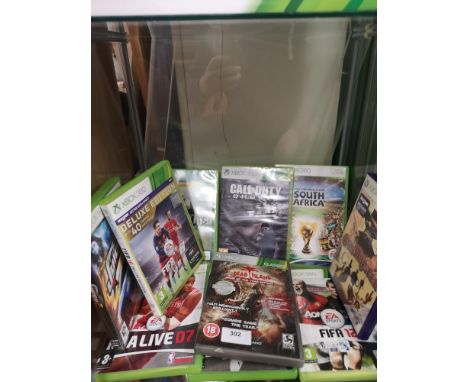 Shelf of xbox 360 games. 