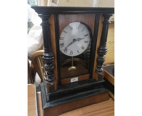 Vintage clock case with modern setting. Needs attention. 