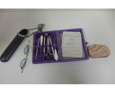 A mother of pearl purse, a spectacle chatelaine and a manicure set 