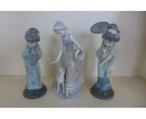 Two Lladro Japanese girls, one with a parasol both good, no boxes and a Nao girl with dog, good condition 