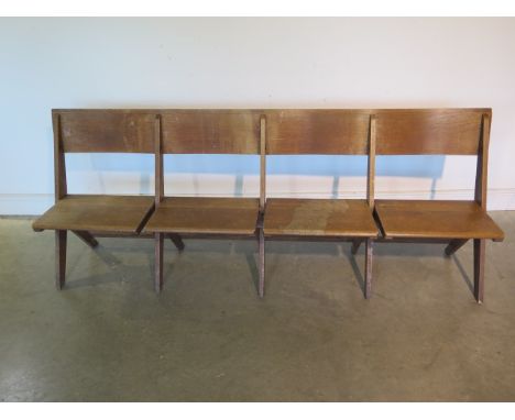 A good quality early four seater 20th century oak church bench which can fold flat, 210cm  - in sound usable condition 