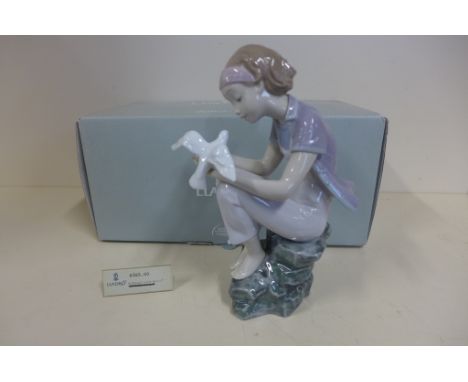 A Lladro figure 'Playing with Doves' 08536 - boxed in good condition - previous shop RRP 265euros 