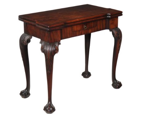  A George II mahogany folding card table,   circa 1750, the hinged rectangular top with rectangular outset front corners,  th