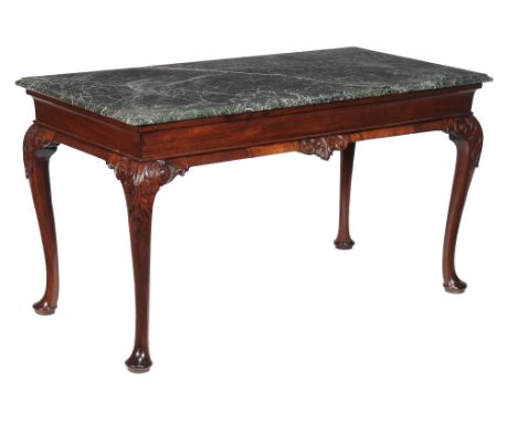  A George II mahogany console table,   circa 1740, the serpentine marble top above the moulded frieze centred by an acanthus 