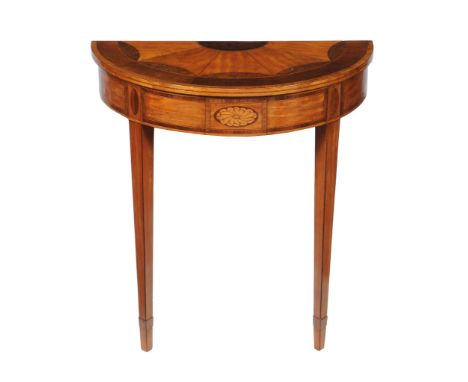  A pair of George III satinwood, burr yew and harewood semi elliptical console tables,   circa 1790, each top incorporating a