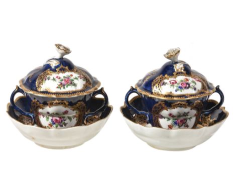  A pair of Worcester blue-ground two-handled chocolate cups, covers and stands,   circa 1770, painted with panels of flowers 