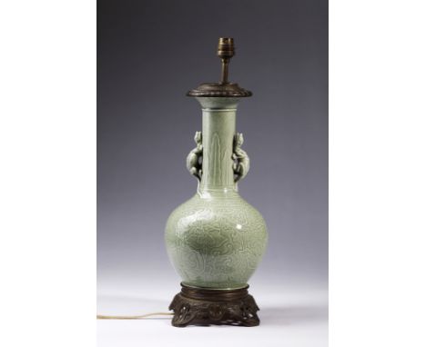 Chinese Art A celadon glazed bottle vase mounted as a lamp China, 19th century . . Cm 17,00 x 40,00 x 17,00.