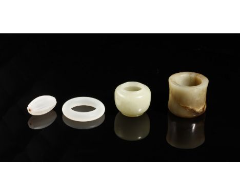 Chinese Art A group of four jade items China, 19th - 20th century . . Cm 3,40.