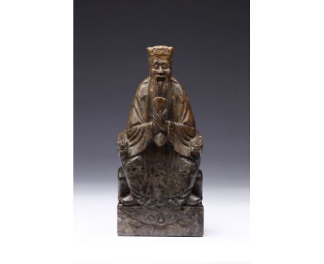 Chinese Art A stone seal carved with a seated official China, 20th century . . Cm 8,50 x 19,00 x 4,00.