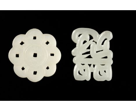 Chinese Art A pair of jade carvings China, 20th century . . Cm 3,50 x 2,50.