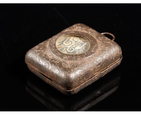 Islamic Art A miniature printed pocket Qur'an within metal caseLevant, early 20th century . . Cm 3,00 x 3,50. Arabic text on 