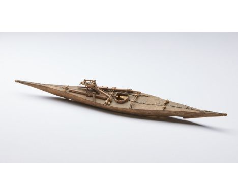 Art of the Americas Model of kayac, InuitAlaska / Greenland. . Cm 42,00 x 3,00 x 5,00. A small scale faithful replica of an E