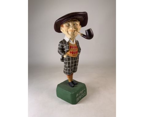 Penfold - A mid 20th century retro vintage shop advertising point of sale display figural stand of 'The Penfold Man' advertis