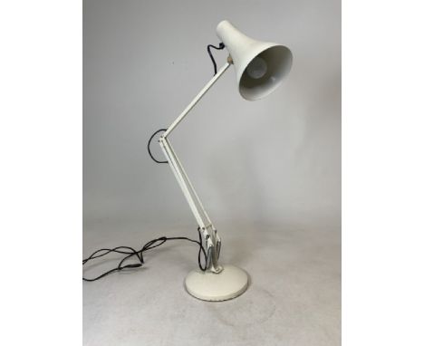 An Anglepoise desk lamp with adjustable angle and height function.