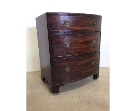 A small mahogany bow fronted chest of three drawers. Converted commode.   W:60cm x D:41cm x H:73cm