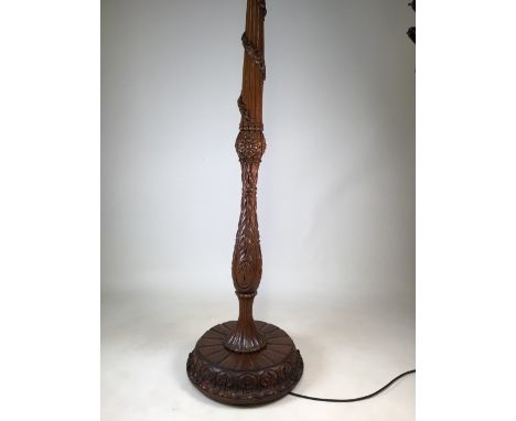 A Black Forrest style standard lamp, possible from Austria. Four sections. W:50cm x D:50cm x H:165cm