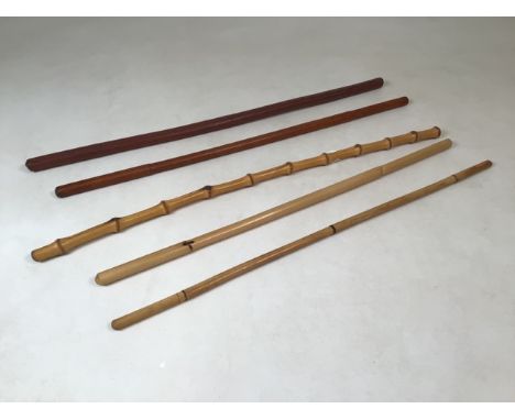 Five swagger sticks. Made from Bamboo and light brown leather casing.