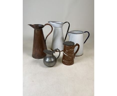 Five metal jugs to include pewter, enamel and copper. 