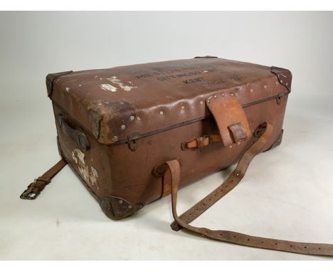 A leather bound travelling trunk. W:78cm x D:48cm x H:32cm
