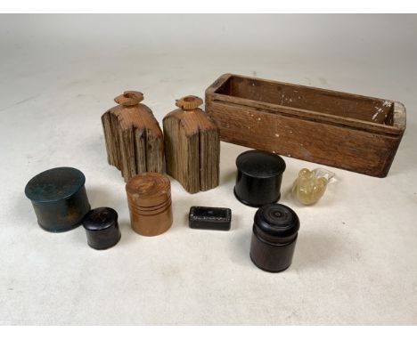 A collection of wood items to include treen boxes, wooden hip flasks, snuff box and a draw. Plus a glass dove.