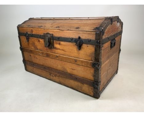 A vintage pine metal bound travelling trunk.  W:83cm x D:49cm x H:54cm