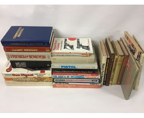 A collection of gun and ammunition reference books. 