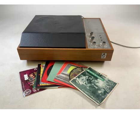 Ultra record player with some 45rpm records.
