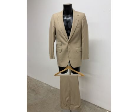 A vintage lightweight two piece two button summer suit by Aquascutum. Size 38-40