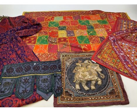 A selection of eastern textiles and needlework.  Largest  W:145cm x H:90cm