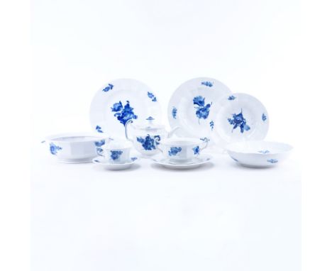 Sixty-Four (64) Pieces Royal Copenhagen Blue Flowers Dinnerware. Includes: 12 plates 10-1/4" (1 with chip), 10 soup plates, 1