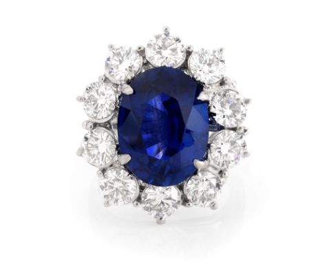 Approx. 7.21 Carat Oval Cut Sapphire, 3.35 Carat Round Brilliant Cut Diamond and 18 Karat White Gold Ring. Sapphire with vivi