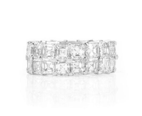 Approx. 9.83 Carat Square Cut Diamond and Platinum Eternity Band. Unsigned. Very good condition. Ring size 6. Approx. weight: