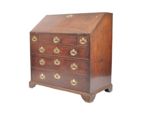 A 19th Century Victorian mahogany bureau / writing table desk having a fall front section top with fitted interior. Below a s