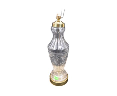 A retro vintage 20th century glass &amp; gilt metal table top lamp. The lamp having a vase shaped cut glass body raised on a 