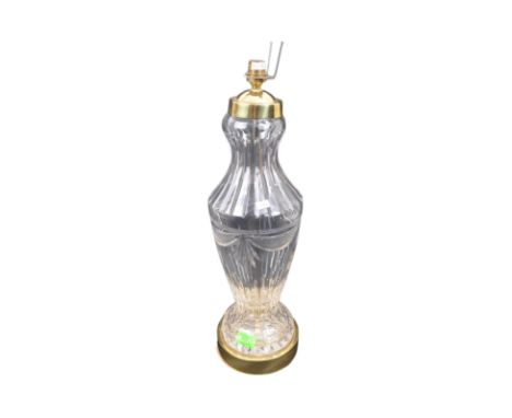 A retro vintage 20th century glass &amp; gilt metal table top lamp. The lamp having a vase shaped cut glass body raised on a 