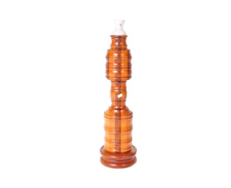 A vintage retro mid 20th Century circa 1960's turned teak wood lamp base. Of circular form with light and dark wood on a circ