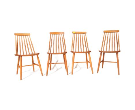 A set of four retro vintage 20th century beech &amp; elm in the manner of Ercol, Continental Czech spindle back dining chairs