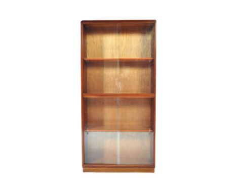 A retro vintage mid 20th Century teak wood lawyer / barrister display bookcase. Of rectangular form with twin glazed sliding 