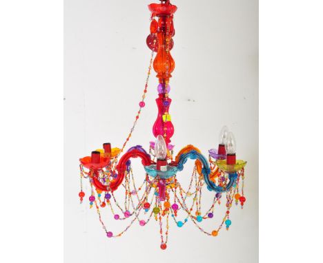 A vintage 20thc century coloured faux glass acrylic six arm chandelier electrolier having handing droplets to each arm.&nbsp;