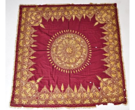 A late 19th century / early 20th century wool Turkish inspired hand stitched metal wire drape tapestry. The table cloth being