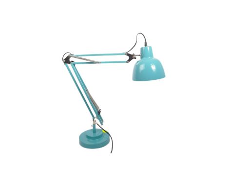 A retro vintage 20th century anglepoise desk top table lamp light in turquoise colour. Unmarked. Raised on circular base.&nbs