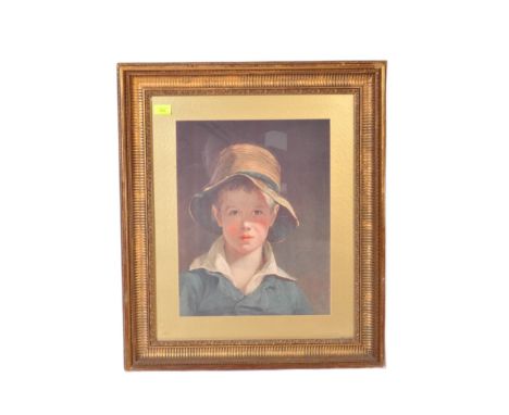 A large vintage 20th century print of 19th century oil on canvas painting of young boy with hat. The print framed &amp; glaze