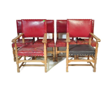 A set of 6 early 20th century light oak and red leather Cromwellian revival dining chairs. Raised on block and turned legs wi