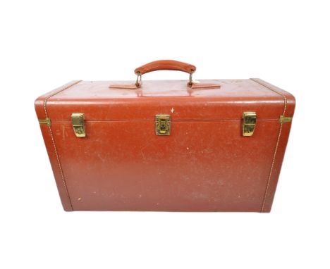 Red leather travel suit case trunk. A vintage 20th Century military travel suitcase trunk chest. With red carry handle to top