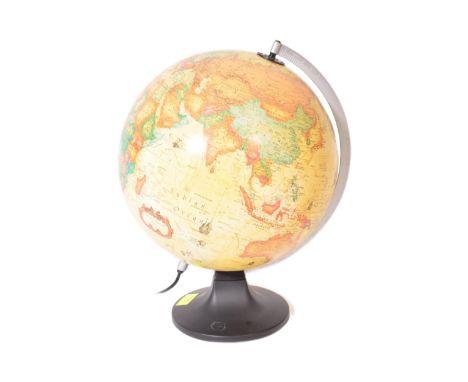 A vintage 20th Century illuminating desk top globe. With a metal curved arm with rotating abilities on plastic black circular