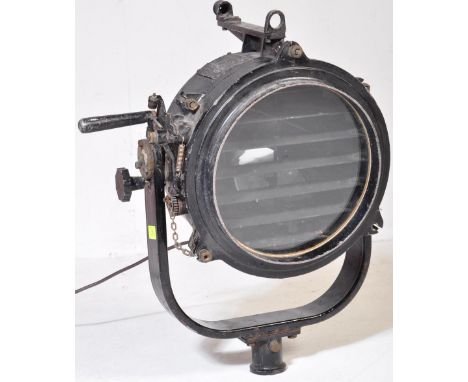 A vintage 20th century black painted metal signalling light having a locking system to adjust light shades. The signalling li