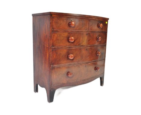 A 19th century George III flame mahogany bow front chest of drawers. Raised on French kick legs with short and deep drawer co