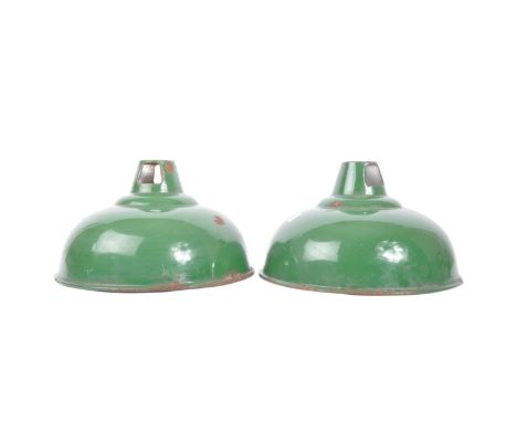 A pair of retro vintage 20th century green enamelled industrial factory shades of circular form. Each measuring approx. 30cm 
