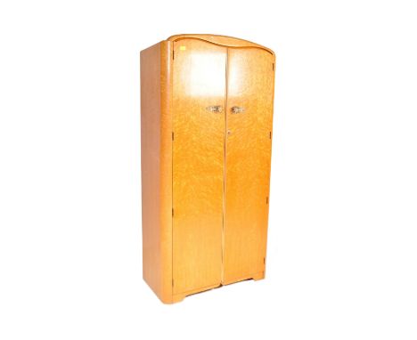 An Art Deco early 20th century circa 1930s Austinsuite birds eye maple double door single wardrobe having a bow top over twin