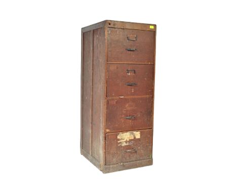 A 20th century vintage office industrial oak early 20th Century 1930s Art Deco era filing cabinet of upright form having four